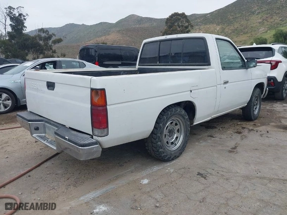 1995 Nissan Trucks 2WD with VIN 1N6SD11S5SC362519, listed as a IAAI auction lot 42034630 with 239,479 mi miles. Bid and sale history available at carsss.com. Image 4.