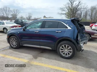 2021 Cadillac XT4 AWD Premium Luxury z VIN 1GYFZDR45MF048569, wystawiony jako IAAI lot #41902941 z przebiegiem 53 891 mil mil oraz . Historia ofert i sprzedaży dostępna na DreamBid. Obrazek 14.