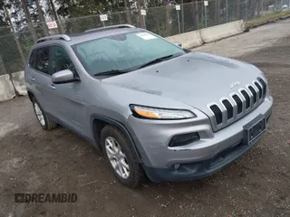 2014 Jeep Cherokee Latitude with VIN 1C4PJLCS0EW322121, listed as a IAAI auction lot 41764642 with 48,766 mi miles. Bid and sale history available at carsss.com. Image 1.