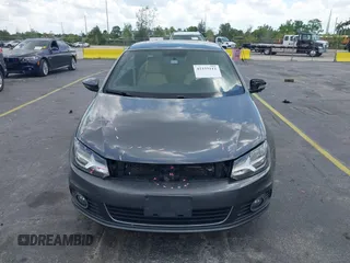 2014 Volkswagen Eos Sport with VIN WVWBW8AH2EV000313, listed as a IAAI auction lot 42333112 with 106,125 mi miles and . Bid and sale history available at DreamBid. Image 12.
