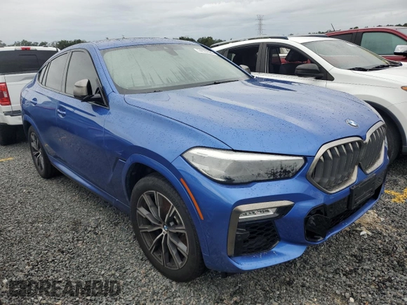 2020 BMW X6 M50i with VIN 5UXCY8C02L9B20285, listed as a Copart auction lot 74127524 with 0 mi miles and Non Repairable. Bid and sale history available at carsss.com. Image 4.