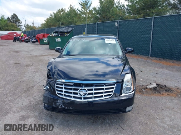 2009 Cadillac DTS 1SC z VIN 1G6KD57Y29U141800, wystawiony jako IAAI lot #42190874 z przebiegiem 115 043 mil mil oraz . Historia ofert i sprzedaży dostępna na DreamBid. Obrazek 12.