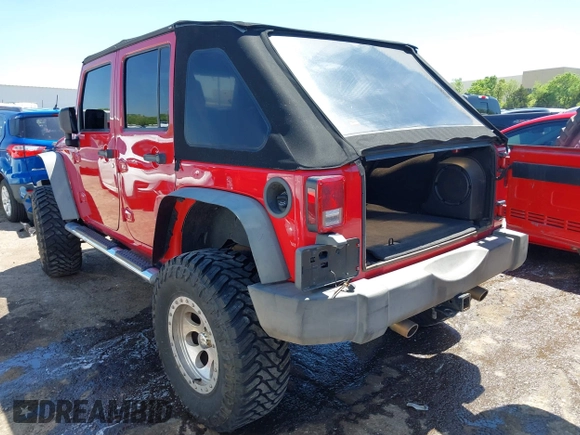 2008 Jeep Wrangler Unlimited X z VIN 1J4GA39198L652015, wystawiony jako IAAI lot #42062691 z przebiegiem 127 804 mil mil oraz . Historia ofert i sprzedaży dostępna na DreamBid. Obrazek 3.