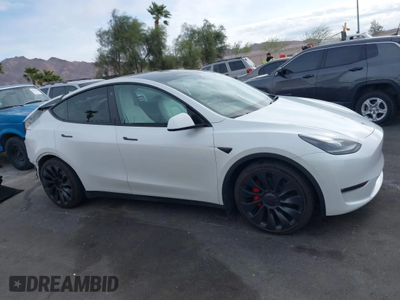 2023 Tesla Model Y Performance with VIN 7SAYGDEFXPF589477, listed as a IAAI auction lot 41936981 with 28,993 mi miles and . Bid and sale history available at DreamBid. Image 14.