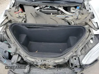 2018 Tesla Model S 75D z VIN 5YJSA1E27JF247900, wystawiony jako Copart lot #52014375 z przebiegiem 106 670 mil mil oraz Szkoda całkowita • Salvage title. Historia ofert i sprzedaży dostępna na DreamBid. Obrazek 12.