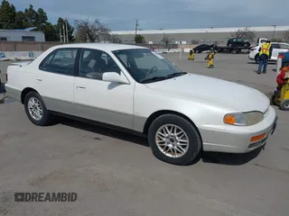 1996 Toyota Camry LE with VIN JT2BF12K9T0134501, listed as a IAAI auction lot 41802086 with 486,071 mi miles and . Bid and sale history available at DreamBid. Image 1.