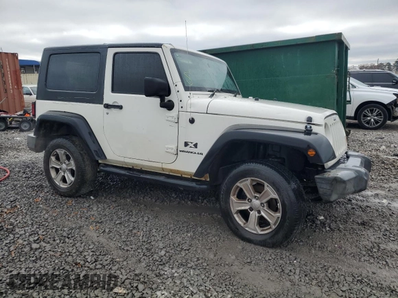 2008 Jeep Wrangler X z VIN 1J4FZ24168L526507, wystawiony jako Copart lot #85711354 z przebiegiem 204 531 mil mil oraz Szkoda całkowita • Salvage title. Historia ofert i sprzedaży dostępna na DreamBid. Obrazek 4.