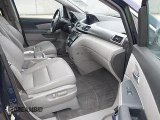 2015 Honda Odyssey EX-L z VIN 5FNRL5H68FB070392, wystawiony jako IAAI lot #42412403 z przebiegiem 146 907 mil mil oraz . Historia ofert i sprzedaży dostępna na DreamBid. Obrazek 5.