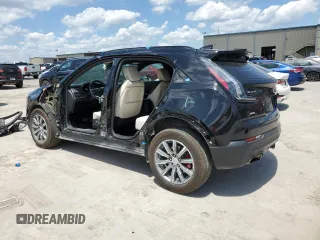 2021 Cadillac XT4 AWD Sport with VIN 1GYFZFR43MF054379, listed as a Copart auction lot 55338315 with 53,693 mi miles and Salvage title. Bid and sale history available at DreamBid. Image 2.