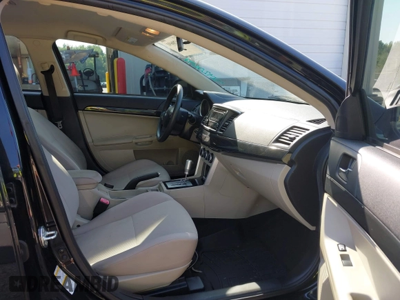 2016 Mitsubishi Lancer ES z VIN JA32U2FUXGU010572, wystawiony jako IAAI lot #42420691 z przebiegiem 71 602 mil mil oraz . Historia ofert i sprzedaży dostępna na DreamBid. Obrazek 5.