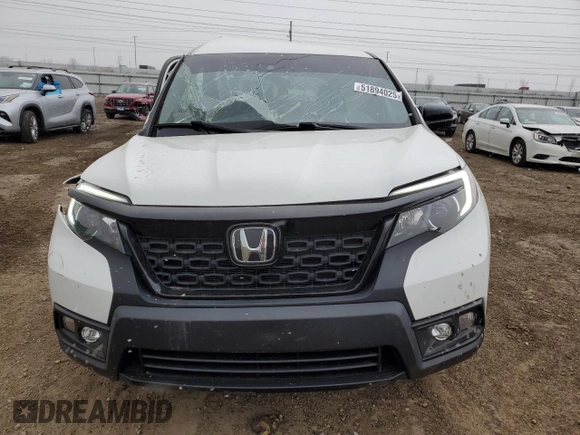 2021 Honda Passport Sport with VIN 5FNYF8H25MB014585, listed as a Copart auction lot 51894025 with 36,910 mi miles and Salvage title. Bid and sale history available at DreamBid. Image 5.