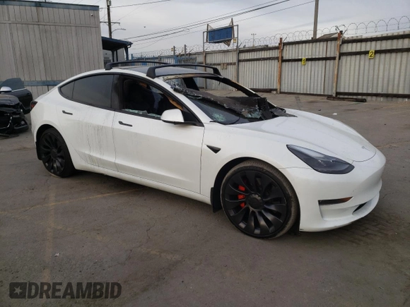 2022 Tesla Model 3 Performance with VIN 5YJ3E1EC3NF265334, listed as a Copart auction lot 84853734 with Not Provided miles and Salvage Title. Bid and sale history available at DreamBid. Image 4.