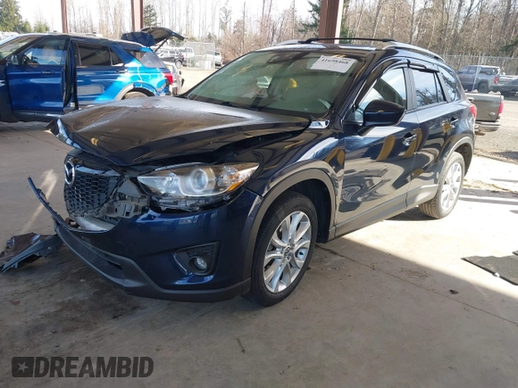 2014 Mazda CX-5 Grand Touring with VIN JM3KE2DY6E0394172, listed as a IAAI auction lot 41698468 with 89,554 mi miles. Bid and sale history available at carsss.com. Image 17.