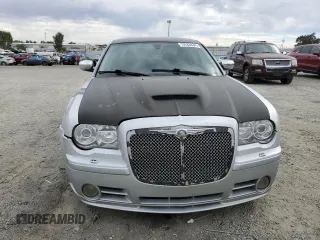 2007 Chrysler 300 C SRT8 with VIN 2C3LA73W07H660214, listed as a Copart auction lot 70283834 with 249,130 mi miles and Salvage Title. Bid and sale history available at carsss.com. Image 5.