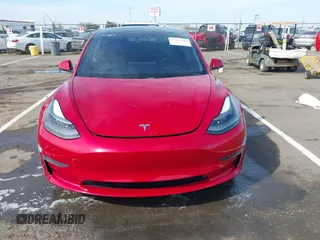 2021 Tesla Model 3 Long Range with VIN 5YJ3E1EB2MF015279, listed as a IAAI auction lot 41765428 with 55,486 mi miles. Bid and sale history available at carsss.com. Image 12.