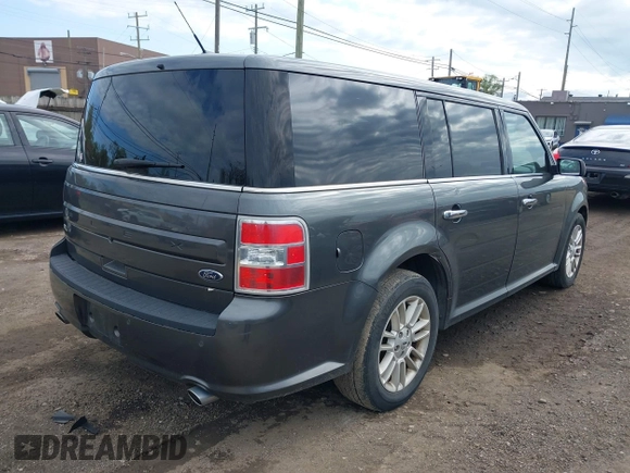 2016 Ford Flex SEL z VIN 2FMGK5C82GBA21945, wystawiony jako IAAI lot #42206498 z przebiegiem 141 320 mil mil oraz . Historia ofert i sprzedaży dostępna na DreamBid. Obrazek 4.