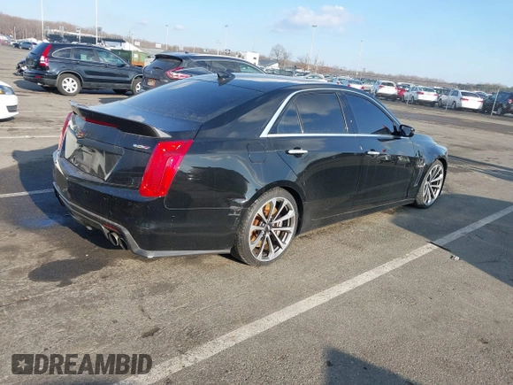 2016 Cadillac CTS-V z VIN 1G6A15S69G0148435, wystawiony jako IAAI lot #41306543 z przebiegiem 22 045 mil mil oraz . Historia ofert i sprzedaży dostępna na DreamBid. Obrazek 4.