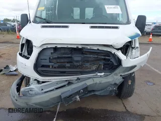 2015 Ford Transit Cargo with VIN 1FTNR2CMXFKA83472, listed as a IAAI auction lot 42212853 with 88,182 mi miles and . Bid and sale history available at DreamBid. Image 6.