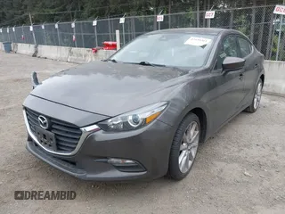2017 Mazda 3 Touring with VIN 3MZBN1V73HM118104, listed as a IAAI auction lot 42139361 with 71,615 mi miles and . Bid and sale history available at DreamBid. Image 17.