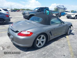 2007 Porsche Boxster z VIN WP0CA29877U710966, wystawiony jako IAAI lot #39794748 z przebiegiem 147 803 mil mil oraz . Historia ofert i sprzedaży dostępna na DreamBid. Obrazek 4.