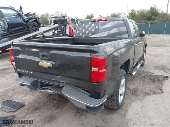 2015 Chevrolet Silverado 1500 LS with VIN 1GCVKPECXFZ436354, listed as a IAAI auction lot 41891065 with 128,164 mi miles. Bid and sale history available at carsss.com. Image 4.