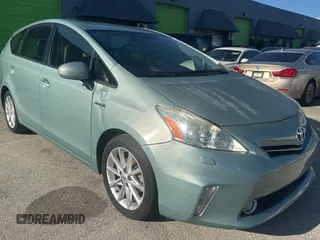 2014 Toyota Prius Two z VIN JTDZN3EU7E3301604, wystawiony jako Copart lot #61496655 z przebiegiem 181 276 mil mil oraz Czysty tytuł • Clean title. Historia ofert i sprzedaży dostępna na DreamBid. Obrazek 1.
