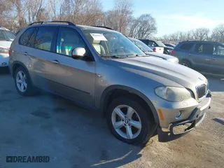 2007 BMW X5 3.0si with VIN 5UXFE43557L011254, listed as a IAAI auction lot 41696843 with 201,402 mi miles. Bid and sale history available at carsss.com. Image 1.