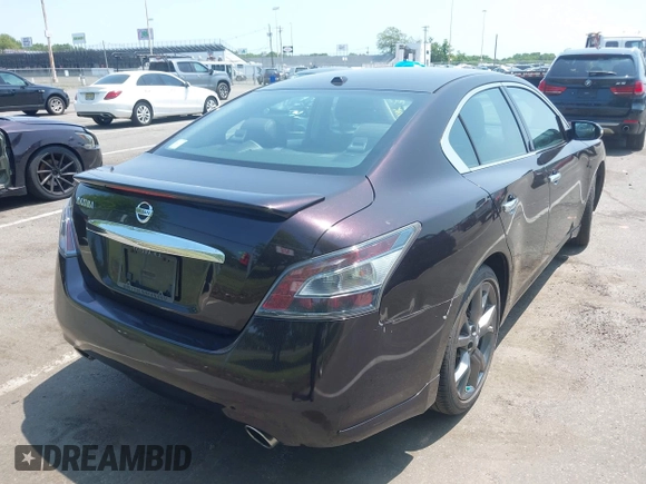 2014 Nissan Maxima SV z VIN 1N4AA5AP7EC486859, wystawiony jako IAAI lot #42420335 z przebiegiem 71 283 mil mil oraz . Historia ofert i sprzedaży dostępna na DreamBid. Obrazek 6.