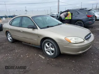 2001 Ford Taurus SES with VIN 1FAFP55S01A155758, listed as a IAAI auction lot 42152091 with 74,817 mi miles. Bid and sale history available at carsss.com. Image 1.