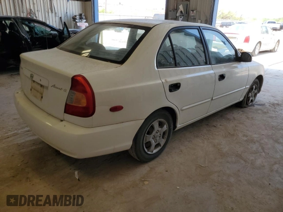 2002 Hyundai Accent GL with VIN KMHCG45C82U380280, listed as a Copart auction lot 79087254 with 173,764 mi miles and Clean Title. Bid and sale history available at carsss.com. Image 3.