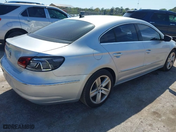 2013 Volkswagen CC Sport with VIN WVWBN7AN7DE556635, listed as a IAAI auction lot 41808795 with 88,482 mi miles. Bid and sale history available at carsss.com. Image 4.