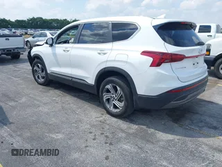 2023 Hyundai Santa Fe SE z VIN 5NMS14AJ6PH631267, wystawiony jako IAAI lot #42053761 z przebiegiem 17 880 mil mil oraz . Historia ofert i sprzedaży dostępna na DreamBid. Obrazek 3.