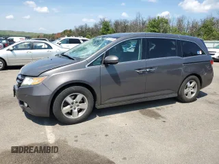 2016 Honda Odyssey Touring Elite with VIN 5FNRL5H91GB059066, listed as a Copart auction lot 66145935 with 132,815 mi miles and Salvage title. Bid and sale history available at DreamBid. Image 1.