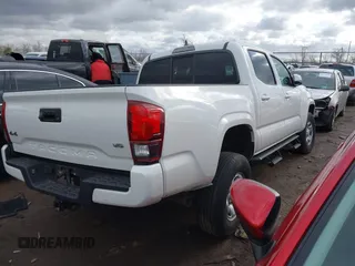 2022 Toyota Tacoma SR with VIN 3TMCZ5ANXNM457736, listed as a IAAI auction lot 41708016 with 44,351 mi miles and . Bid and sale history available at DreamBid. Image 4.