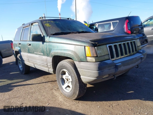 1997 Jeep Grand Cherokee Laredo with VIN 1J4GZ58S2VC605385, listed as a IAAI auction lot 41797715 with 169,996 mi miles and . Bid and sale history available at DreamBid. Image 1.