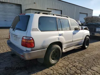 2000 Toyota Land Cruiser with VIN JT3HT05J5Y0105435, listed as a Copart auction lot 89409795 with 255,587 mi miles and Salvage Title. Bid and sale history available at carsss.com. Image 3.