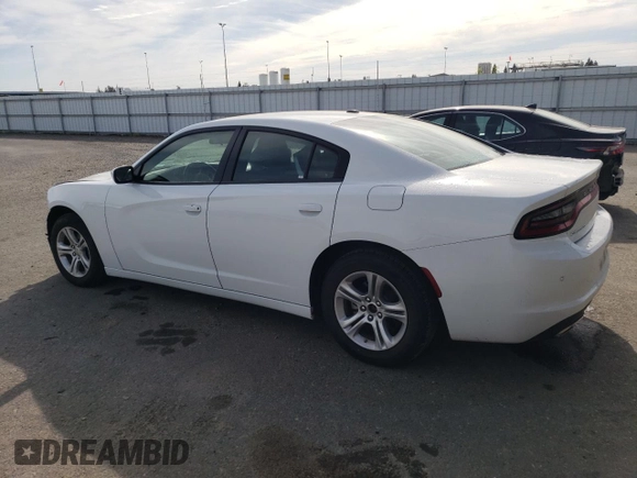 2022 Dodge Charger SXT with VIN 2C3CDXBG9NH212598, listed as a Copart auction lot 52909355 with 66,773 mi miles and Clean Title. Bid and sale history available at DreamBid. Image 2.