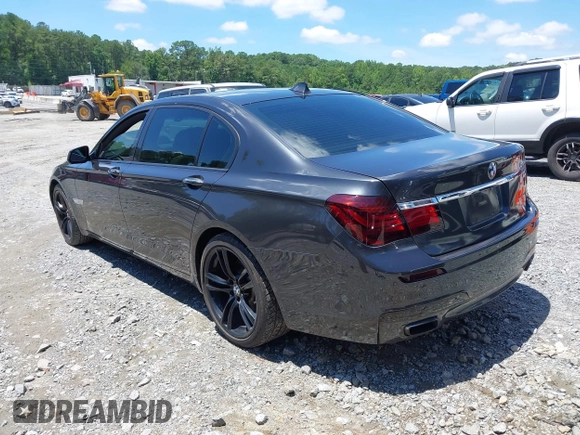 2012 BMW 7 Series 740Li with VIN WBAKB4C5XCC575580, listed as a IAAI auction lot 42658668 with 155,344 mi miles and . Bid and sale history available at DreamBid. Image 3.