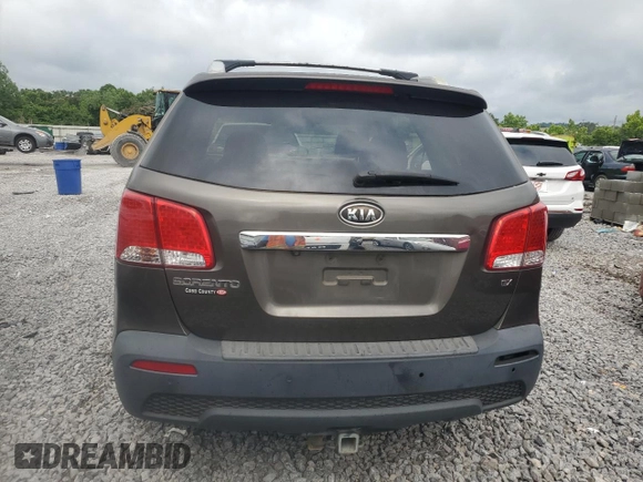 2012 Kia Sorento EX z VIN 5XYKU3A69CG279061, wystawiony jako Copart lot #60088605 z przebiegiem 272 332 mil mil oraz Czysty tytuł • Clean title. Historia ofert i sprzedaży dostępna na DreamBid. Obrazek 6.