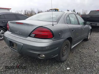 2004 Pontiac Grand Am SE with VIN 1G2NE52F94M530881, listed as a IAAI auction lot 41648302 with 116,540 mi miles. Bid and sale history available at carsss.com. Image 4.