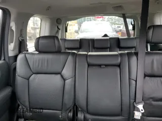2011 Honda Pilot EX-L z VIN 5FNYF4H76BB095369, wystawiony jako Copart lot #57026435 z przebiegiem 128 443 mil mil oraz Szkoda całkowita • Salvage title. Historia ofert i sprzedaży dostępna na DreamBid. Obrazek 10.