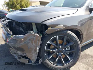 2018 Dodge Durango R/T with VIN 1C4SDHCT7JC451590, listed as a IAAI auction lot 42218120 with 81,254 mi miles and . Bid and sale history available at DreamBid. Image 6.