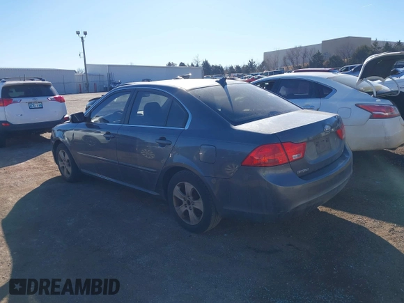 2009 Kia Optima LX with VIN KNAGE228395361458, listed as a IAAI auction lot 41418800 with 182,220 mi miles. Bid and sale history available at carsss.com. Image 3.