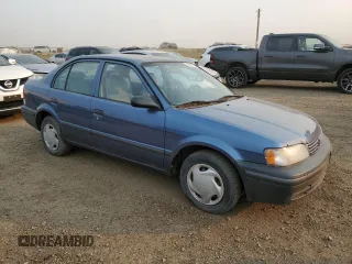 1999 Toyota Tercel z VIN JT2BC53L7X0375230, wystawiony jako Copart lot #70630744 z przebiegiem 238 020 mil mil oraz Tytuł czysty. Historia ofert i sprzedaży dostępna na DreamBid. Obrazek 4.