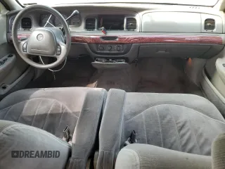 2000 Mercury Grand Marquis GS z VIN 2MEFM74WXYX699560, wystawiony jako Copart lot #57721925 z przebiegiem 246 297 mil mil oraz Szkoda całkowita • Salvage title. Historia ofert i sprzedaży dostępna na DreamBid. Obrazek 8.