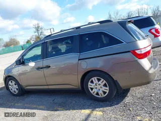 2012 Honda Odyssey LX with VIN 5FNRL5H29CB091860, listed as a IAAI auction lot 42000688 with 295,551 mi miles. Bid and sale history available at carsss.com. Image 14.