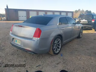 2016 Chrysler 300 with VIN 2C3CCAPG6GH167731, listed as a IAAI auction lot 41779615 with 127,679 mi miles. Bid and sale history available at carsss.com. Image 4.