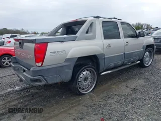 2004 Chevrolet Avalanche Z71 with VIN 3GNEK12T24G147409, listed as a IAAI auction lot 41843423 with 265,742 mi miles. Bid and sale history available at carsss.com. Image 4.