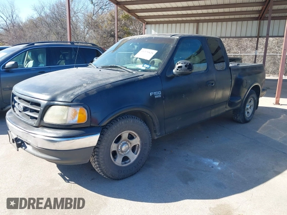 2001 Ford F-150 XL with VIN 2FTRX07W61CA71131, listed as a IAAI auction lot 41375828 with 216,340 mi miles. Bid and sale history available at carsss.com. Image 2.