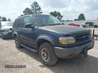 1999 Ford Explorer Sport with VIN 1FMYU22X1XUB45978, listed as a IAAI auction lot 42631114 with 206,634 mi miles and . Bid and sale history available at DreamBid. Image 1.
